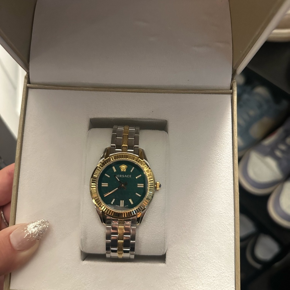 Versace Gold and Silver Timepiece with Blue Face